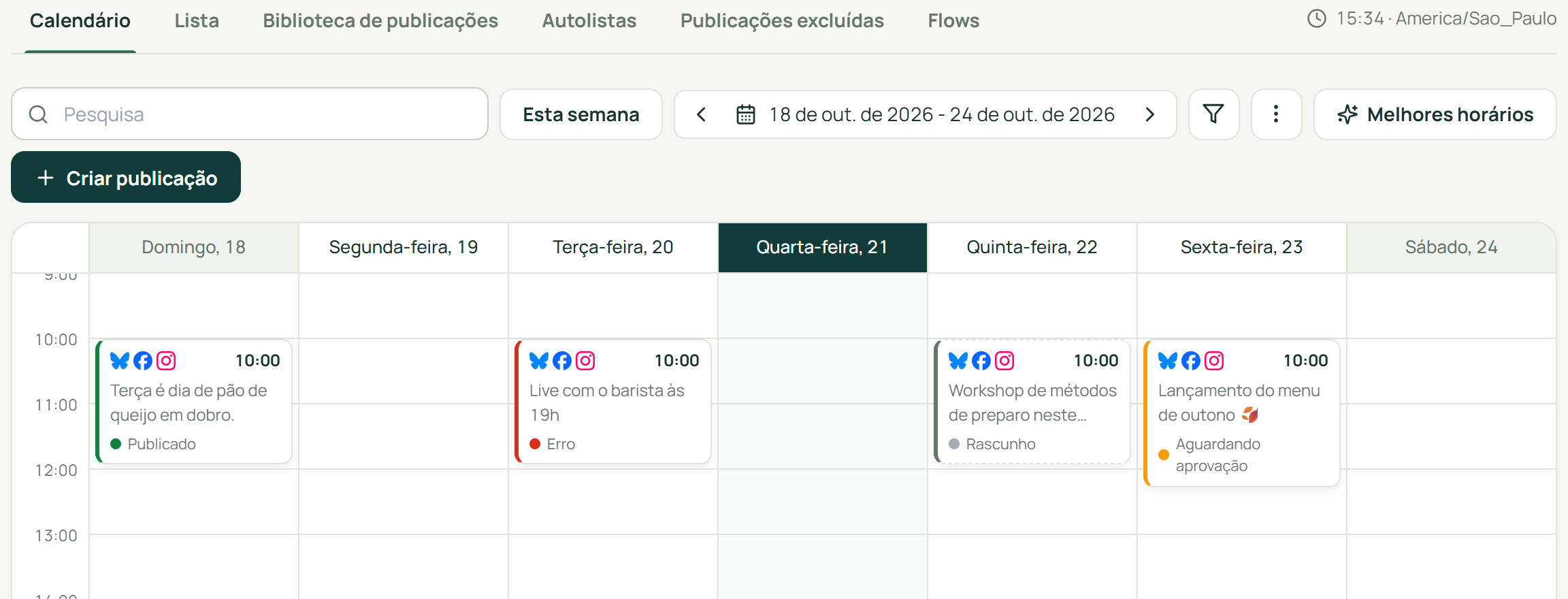 Calendário real do metrifree com publicações e status da marca Café Aurora de demonstração.